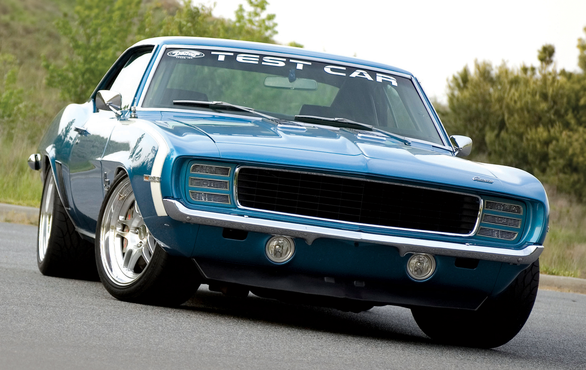 This blue ’69 Camaro was DSE’s ultimate test car, owned by Stacy Tucker and constantly pushed to its limits on autocross courses and road tracks. Packed with a DSE hydroformed front subframe, tubular control arms, C6 Corvette knuckles, Baer brakes, Fikse wheels with BFGoodrich tires, and a 383ci GM Performance Parts crate engine, every component was engineered and tested for peak performance.