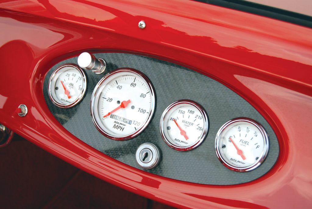 Auto Meter gauges fill the carbon-fiber dash insert, a contemporary touch that works surprisingly well with the rest of this Ford’s vintage styling. An auxiliary tach lies behind the removable sprint-car steering wheel.
