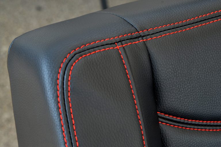 You can choose either red or black stitching.