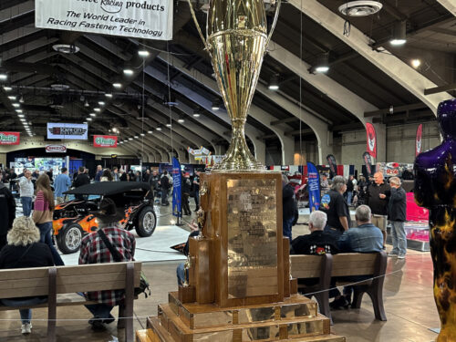 The "America’s Most Beautiful Roadster" (AMBR) award, presented annually at the Grand National Roadster Show, honors the best roadster with this 9-foot "mega-trophy." Created by Al Slonaker, the trophy was the world's largest when it was created.